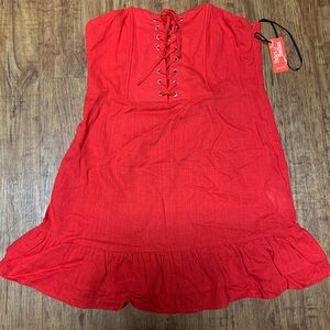 Red strapless lace-up front mini dress